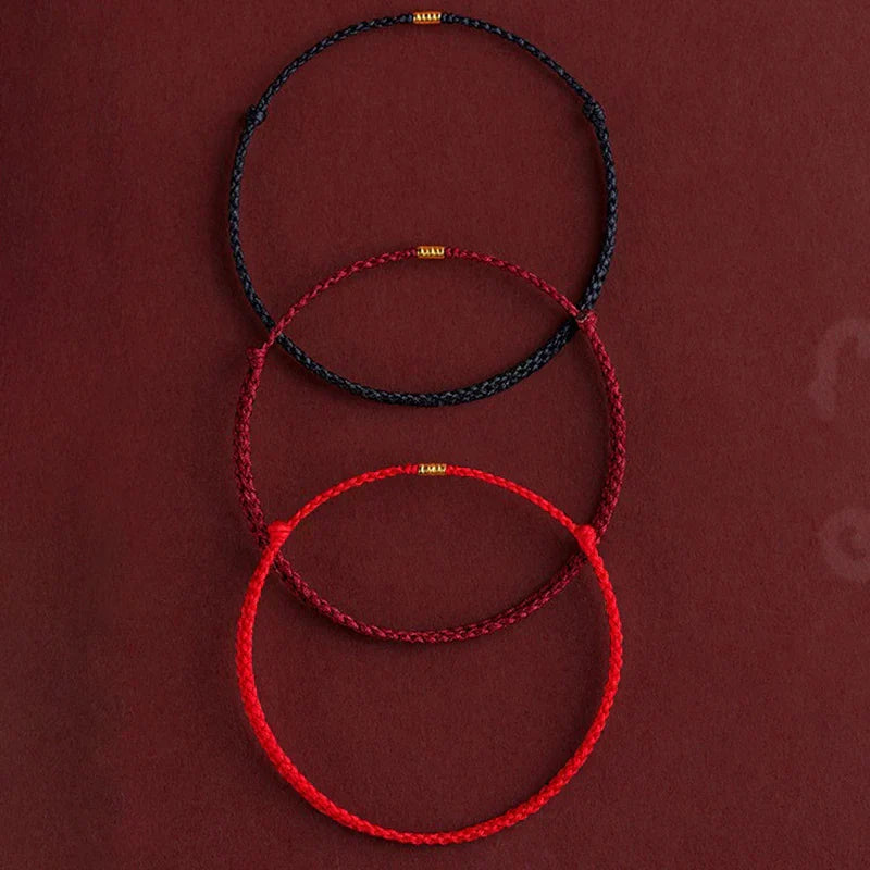 Braided cord Tibetan blessing bracelet, handmade for good fortune & harmony. Unisex adjustable spiritual accessory.