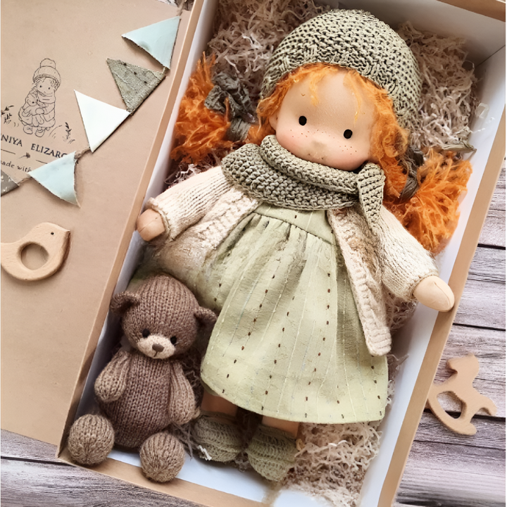 Close-up of Waldorf doll's clothing, simple and removable, encourages dressing skills, soft doll