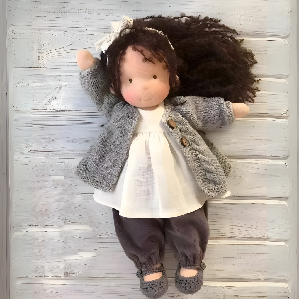 Organic Waldorf doll in a basket with other natural toys, perfect for playrooms & gifting