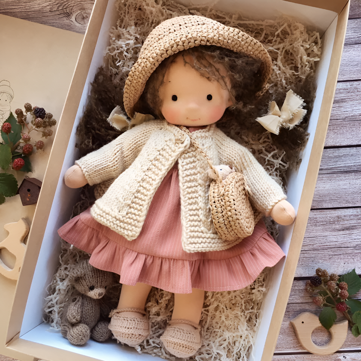 Waldorf doll on a swing, inviting active imaginative play, durable, handmade, natural toy