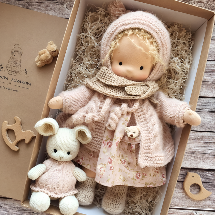 Small child embracing a large organic Waldorf doll, showing its comforting size, wool & cotton