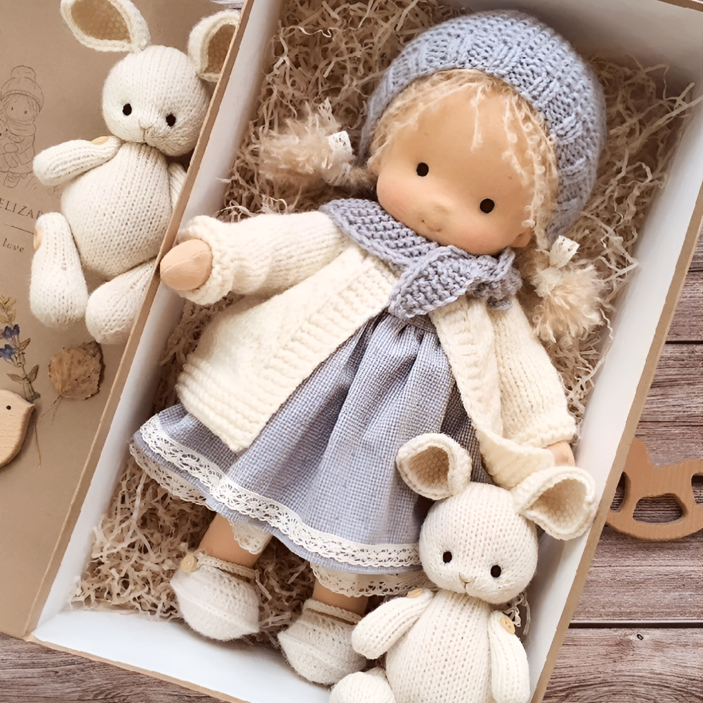 Waldorf doll next to a window, capturing natural light on organic cotton and wool textures