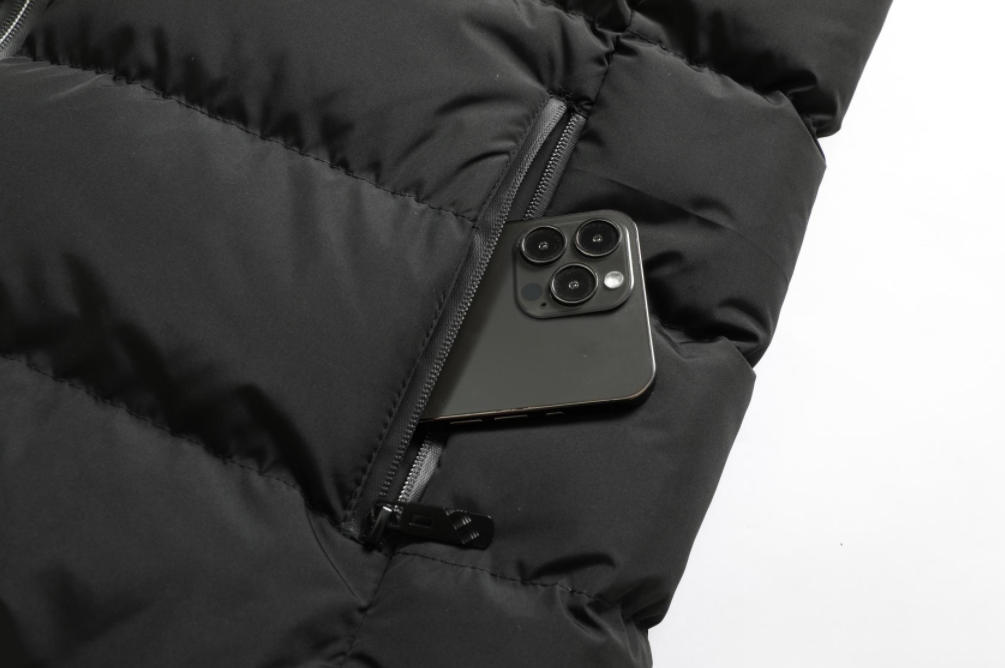 Unisex heated jacket: water-repellent, adjustable warmth, multiple heating zones, perfect for winter sports.