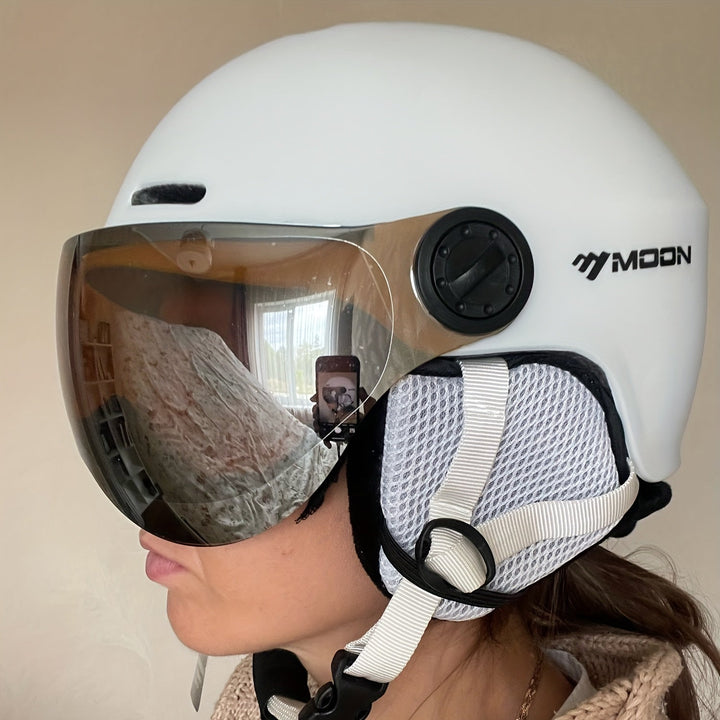 Side profile of a unisex ski helmet showing adjustable strap. Comfortable head protection for winter activities.