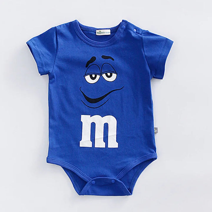 Vibrant M&M faces colorful print baby romper. Short sleeve infant jumpsuit, a playful and comfy toddler outfit.