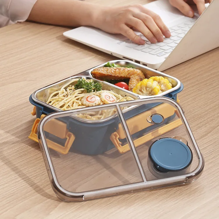 Leakproof insulated food container with multiple compartments for secure & mess-free meal prep.