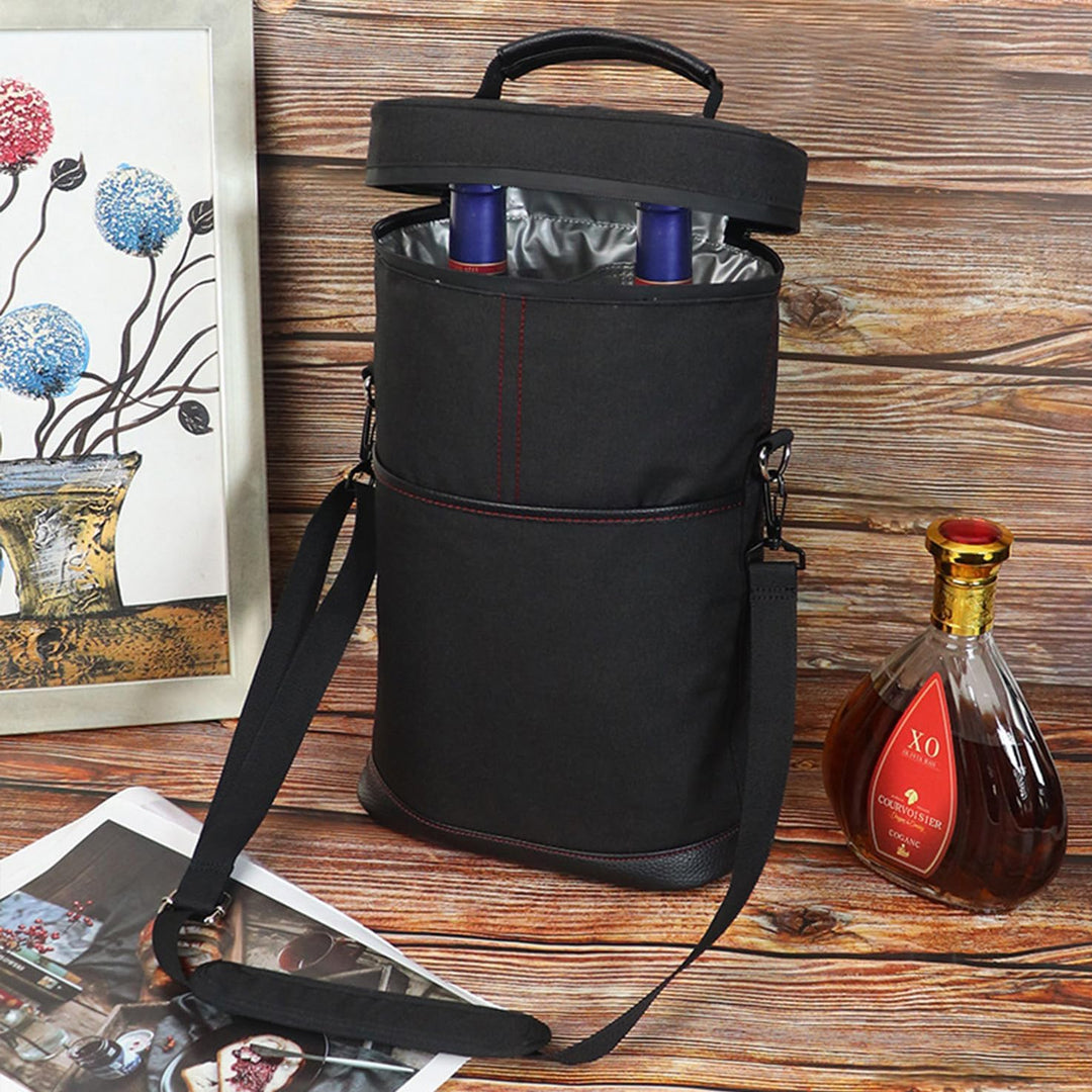 Keeps wine chilled: insulated 2-bottle beverage carrier in durable canvas for travel.