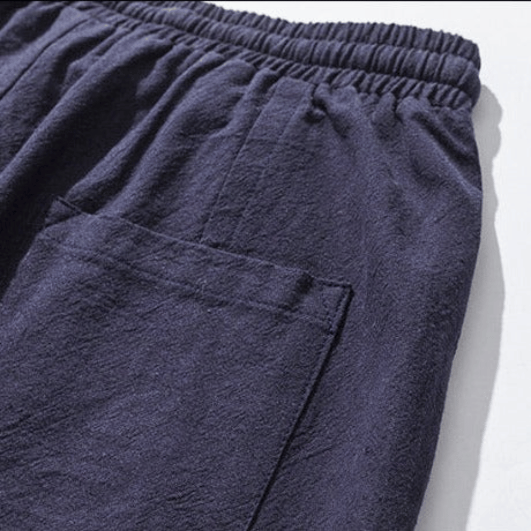 Navy blue unisex Japanese style tapered pants, relaxed fit for comfort & modern fashion street style.