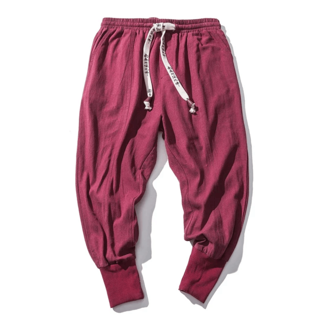 Comfortable unisex relaxed fit tapered pants with drawstring, Japanese style for versatile casual wear.