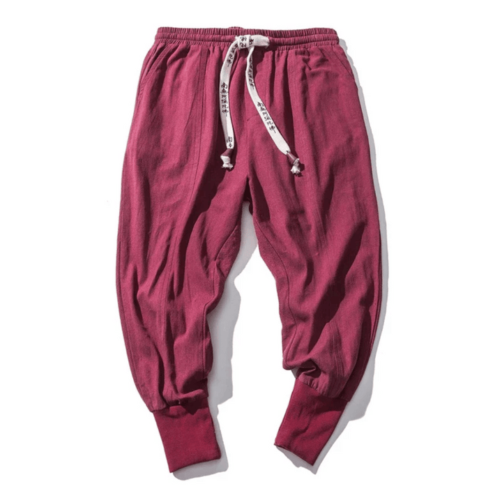 Comfortable unisex relaxed fit tapered pants with drawstring, Japanese style for versatile casual wear.