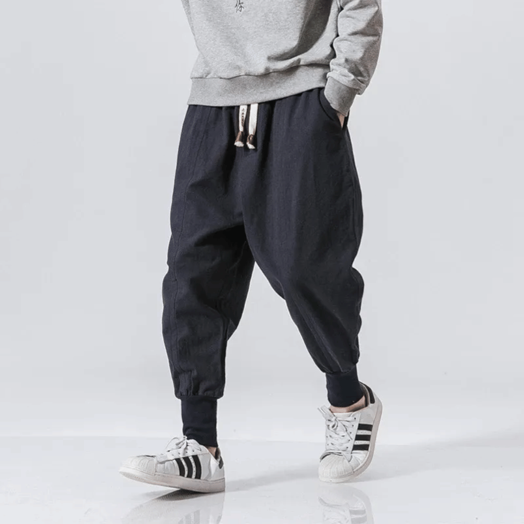 Modern unisex Japanese style pants, relaxed fit & tapered leg for comfortable everyday street fashion.