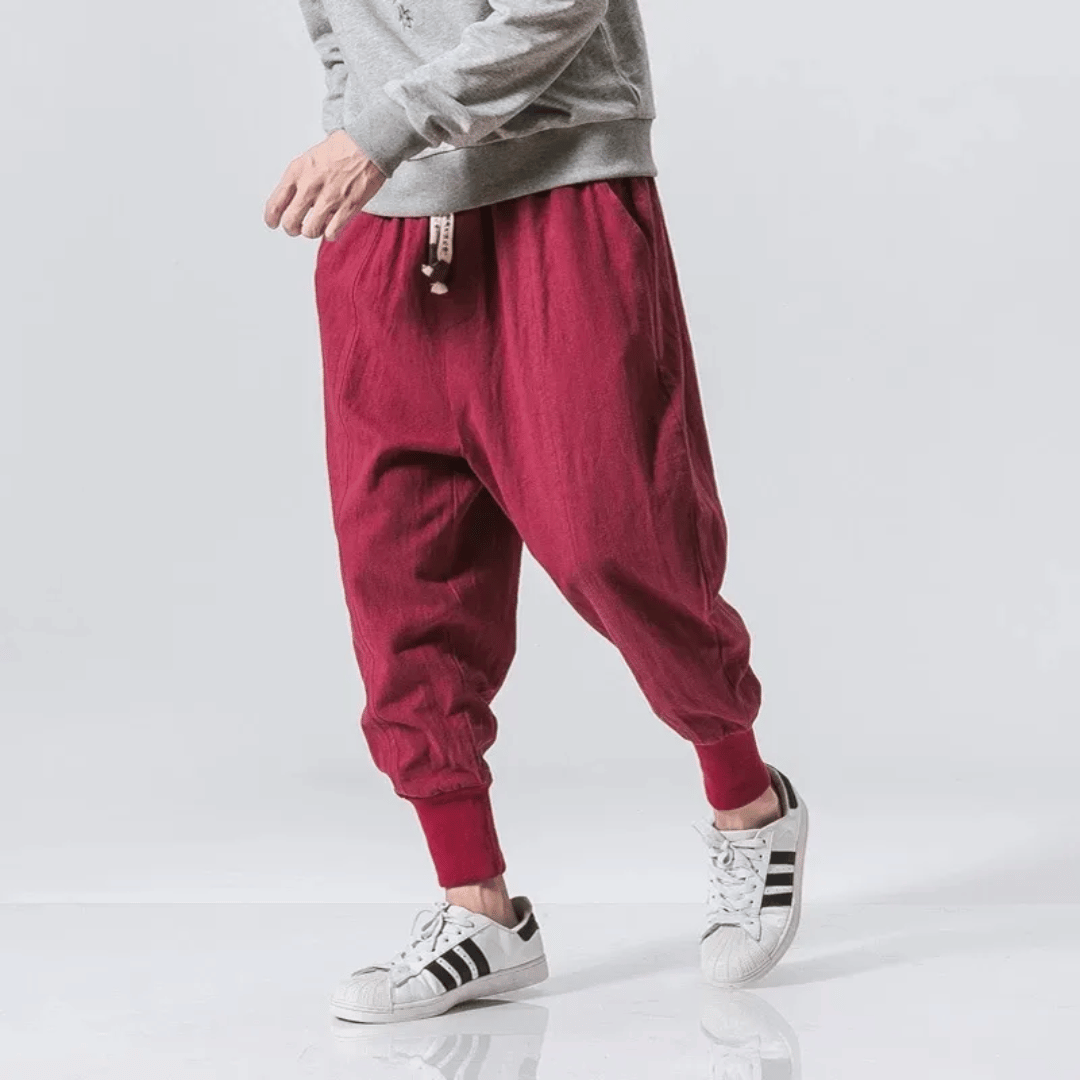 Casual unisex Japanese style pants with a relaxed tapered fit, perfect for comfortable street style fashion.