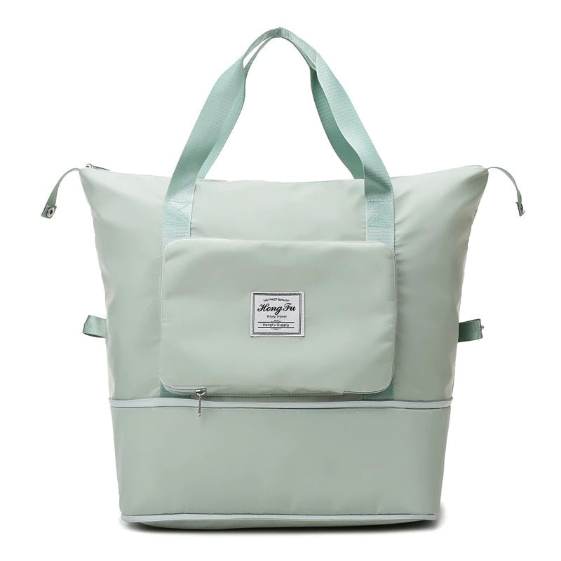 Versatile unisex travel duffel bag, sleek design suitable for men and women on the go.