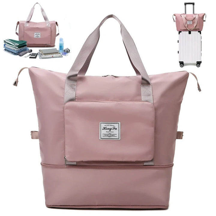 Lightweight waterproof weekender bag on luggage handle, easy transport through airport.