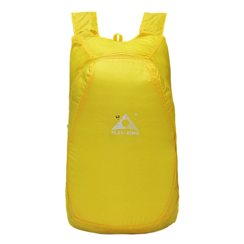Lightweight 20L daypack, water-resistant and foldable, ideal compact travel bag for hiking trails.