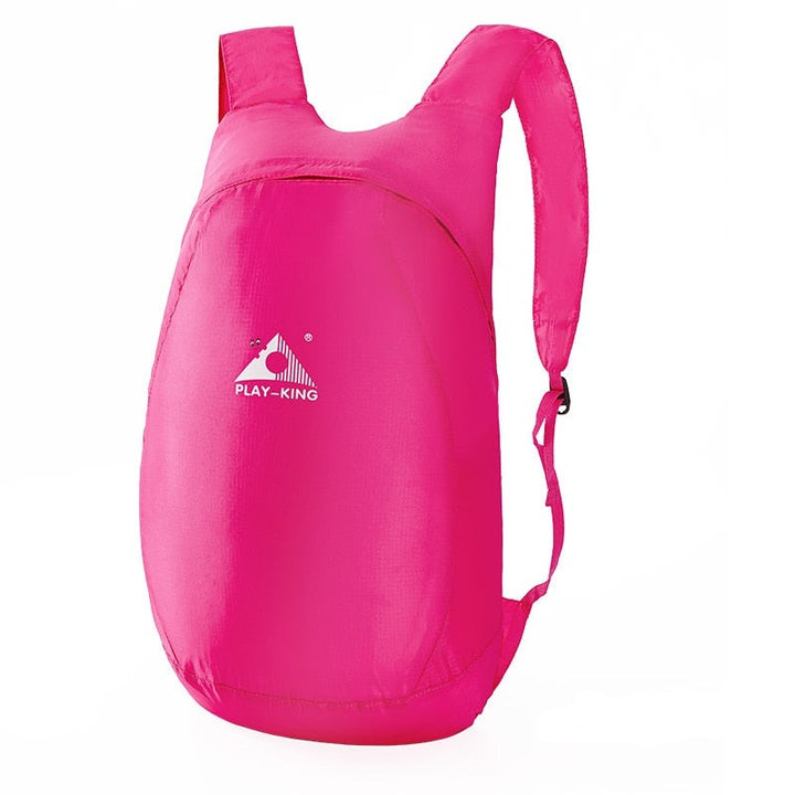 Unisex compact 20L travel backpack, lightweight & water-resistant, folds for ultimate portability.