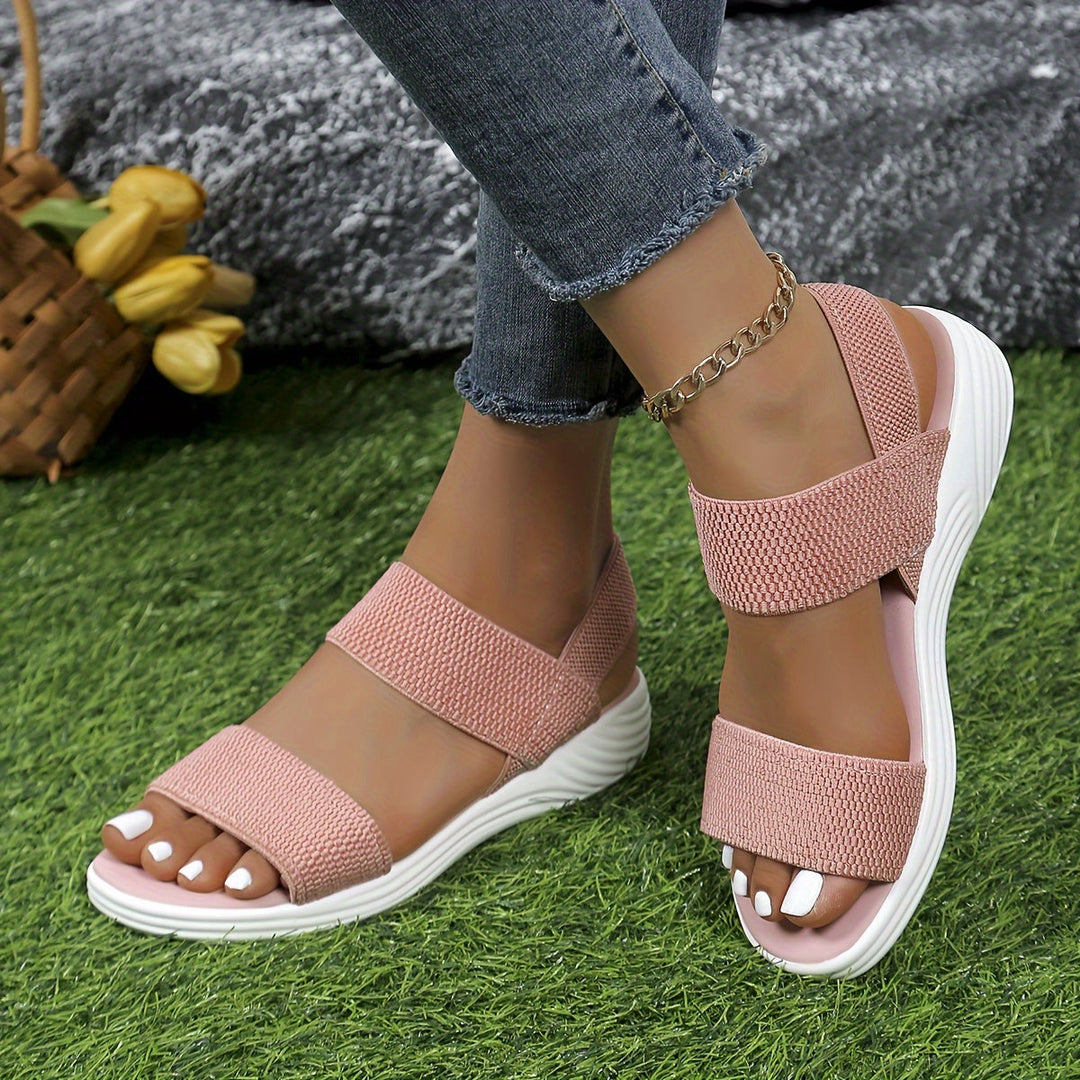 Model wearing black unisex orthopedic comfort sandals, illustrating casual and supportive style.