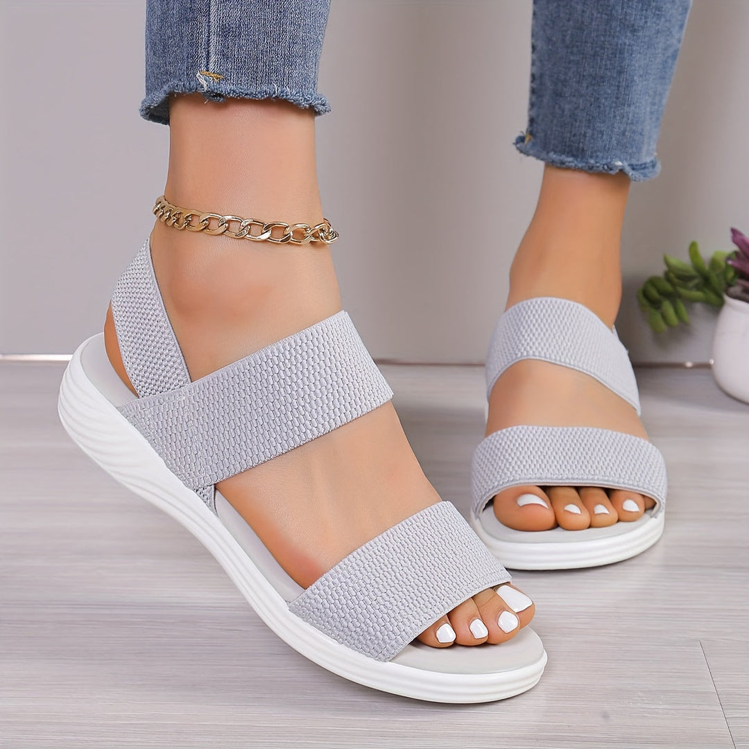 Set of different colored unisex orthopedic comfort sandals, emphasizing bulk purchases or options.