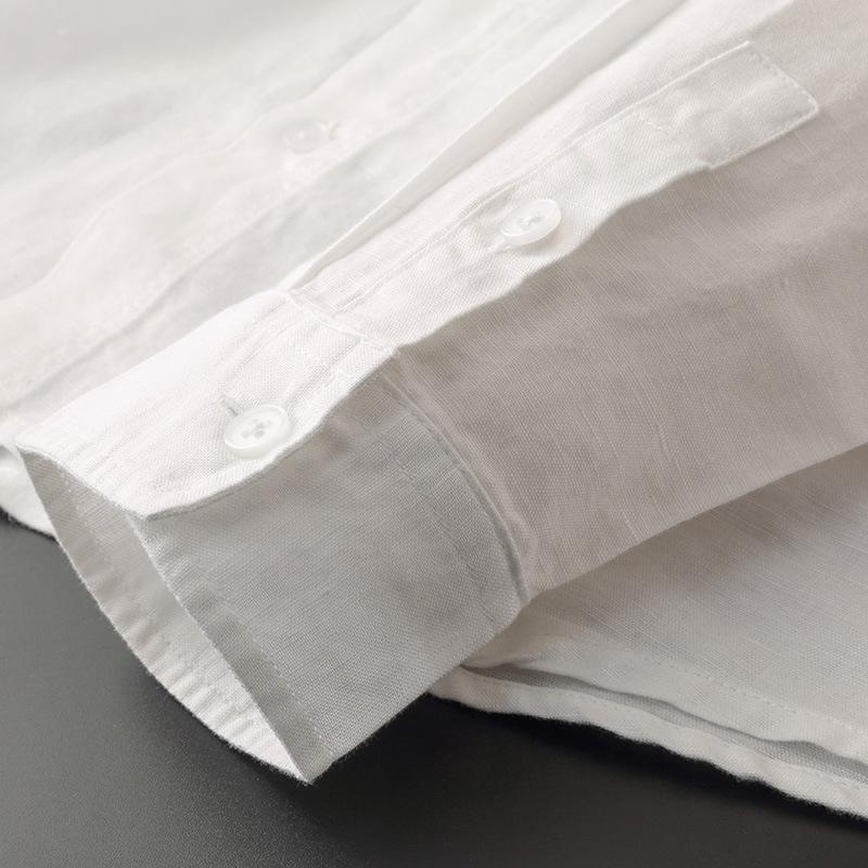 Hanging unisex linen hoodie, highlighting its lightweight design for summer coats.