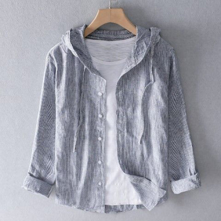 Unisex linen hoodie, perfect for layering during cool summer evenings.