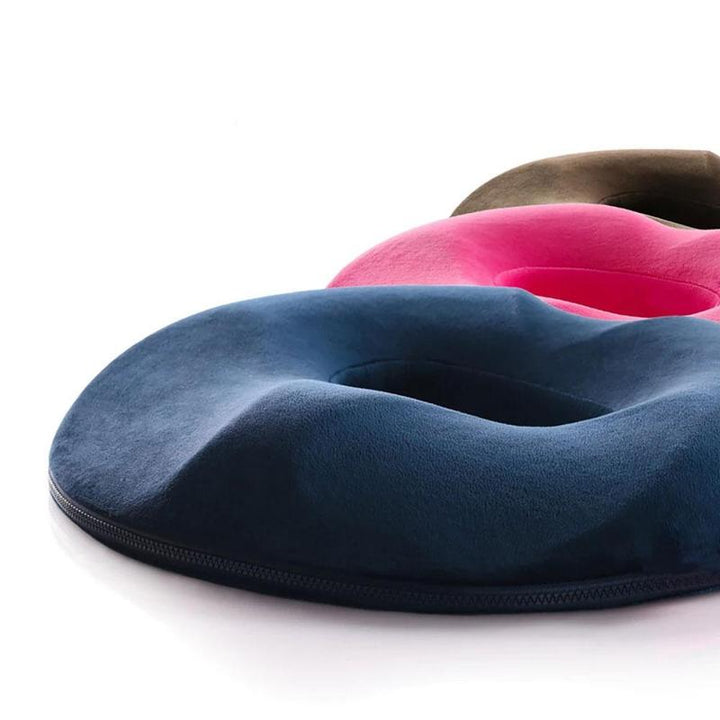 Unisex memory foam coccyx & hemorrhoid relief seat cushion for pain-reducing support & comfortable sitting.