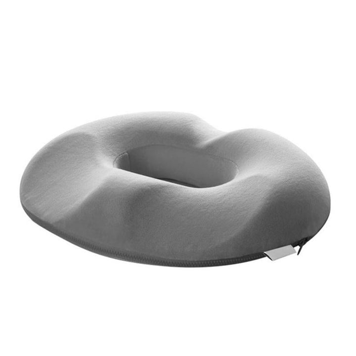 Memory foam seat cushion with ergonomic cut-out for tailbone & hemorrhoid pain relief, enhancing sitting comfort.