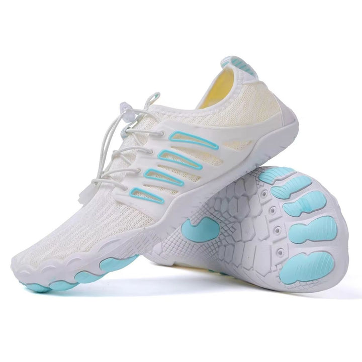 Pair of flexible sole barefoot shoes for women and men, gray, promoting natural foot movement