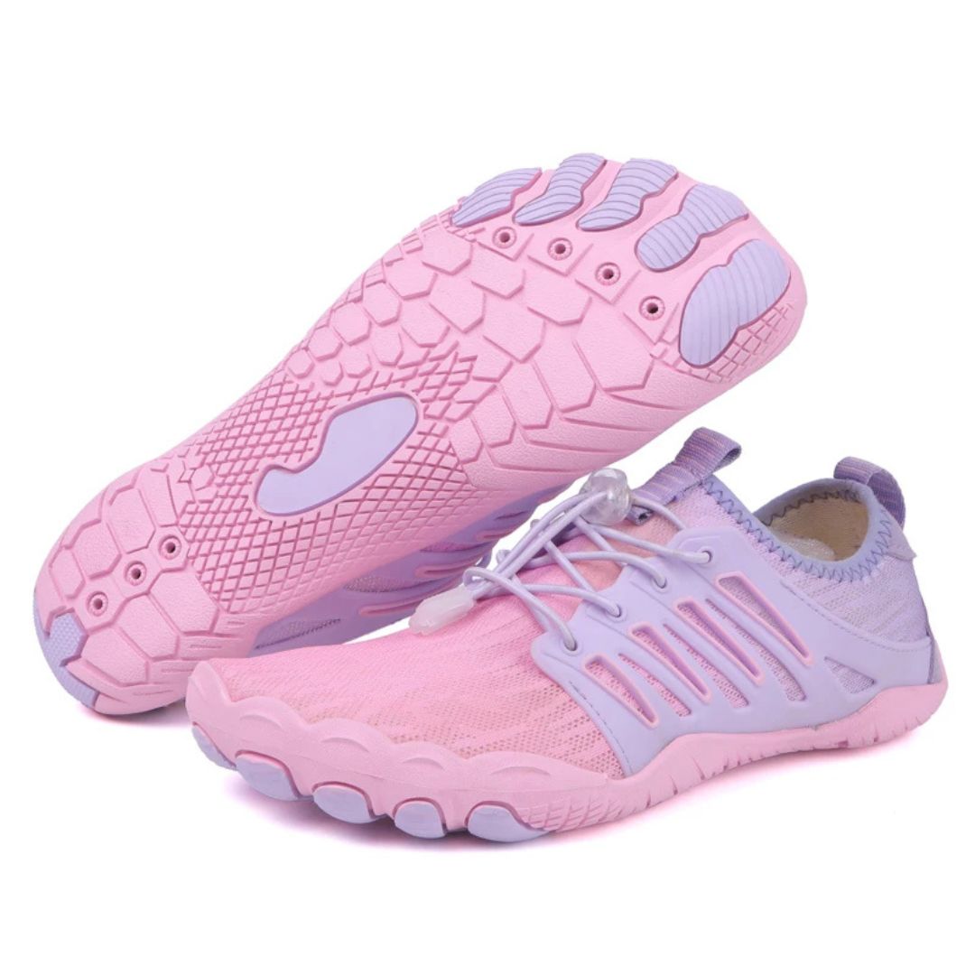 Close-up of the breathable upper material on a minimalist unisex shoe, promoting foot health