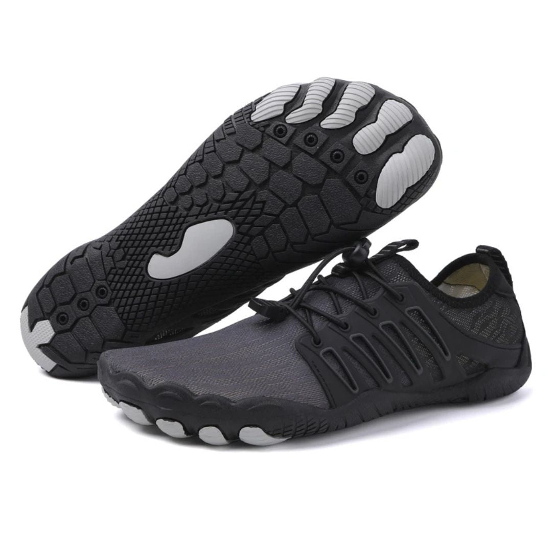 Side view of a lightweight barefoot fitness shoe, black, designed for natural foot flexibility