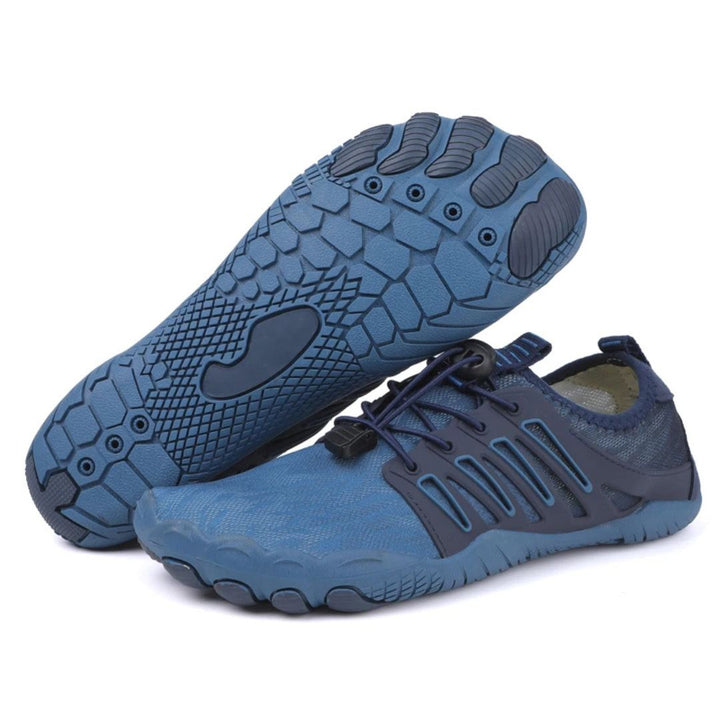 Unisex minimalist shoes in a vibrant red, highlighting the flexible sole and breathable design