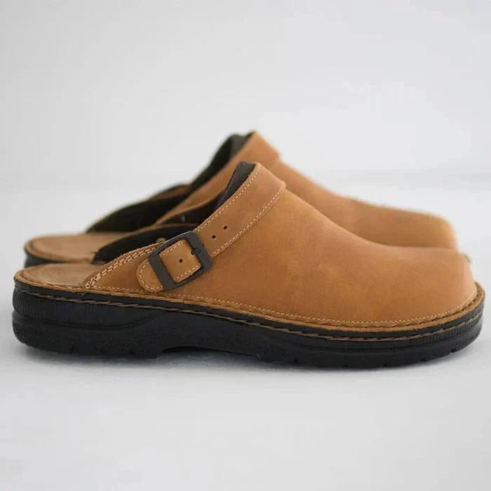 Front view of stylish dark brown orthopaedic leather clogs, slip-on, durable construction