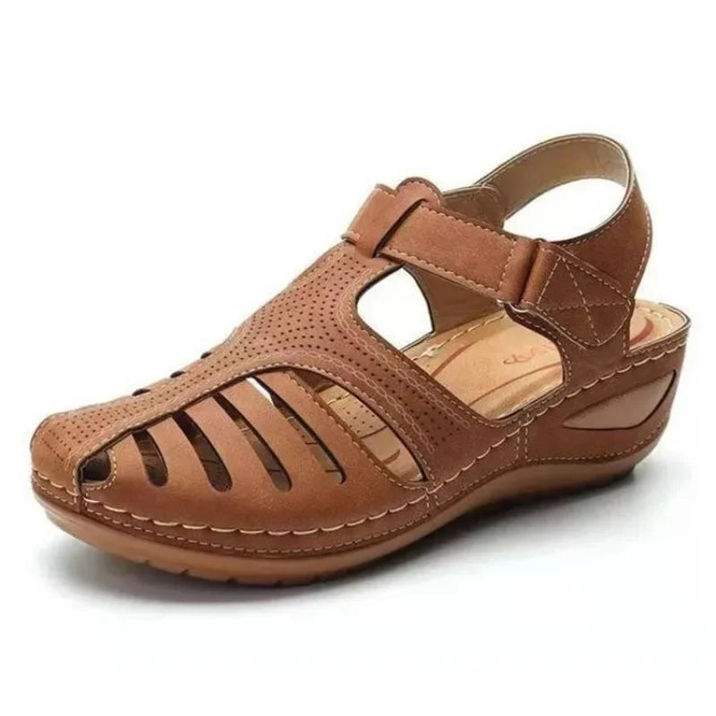 Pair of unisex arch support sandals designed for pain relief and summer comfort.