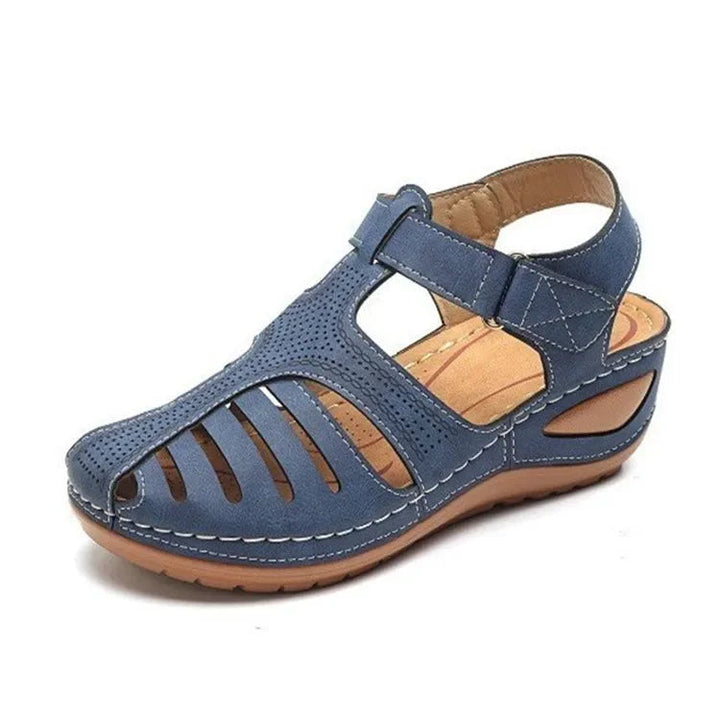 Orthopedic slide sandals with contoured footbed for arch support, suitable for men and women.