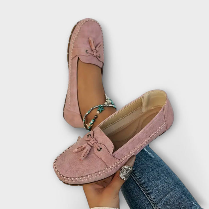 Dressy yet comfortable unisex loafers, perfect for all seasons, featuring supportive orthopedic design.
