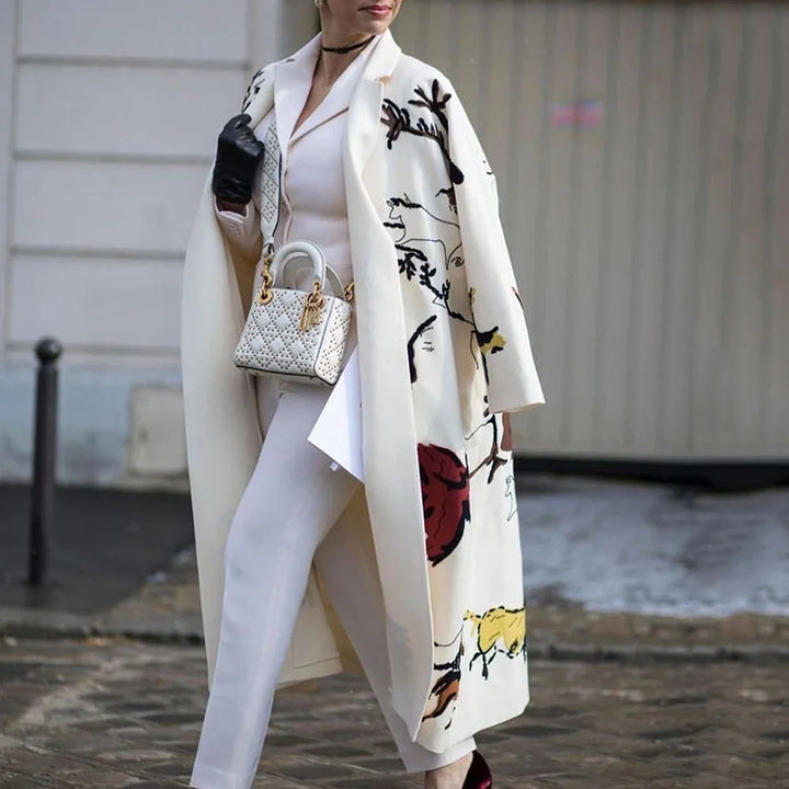 Stylish oversized coat, a comfortable and versatile unisex jacket for a modern look.