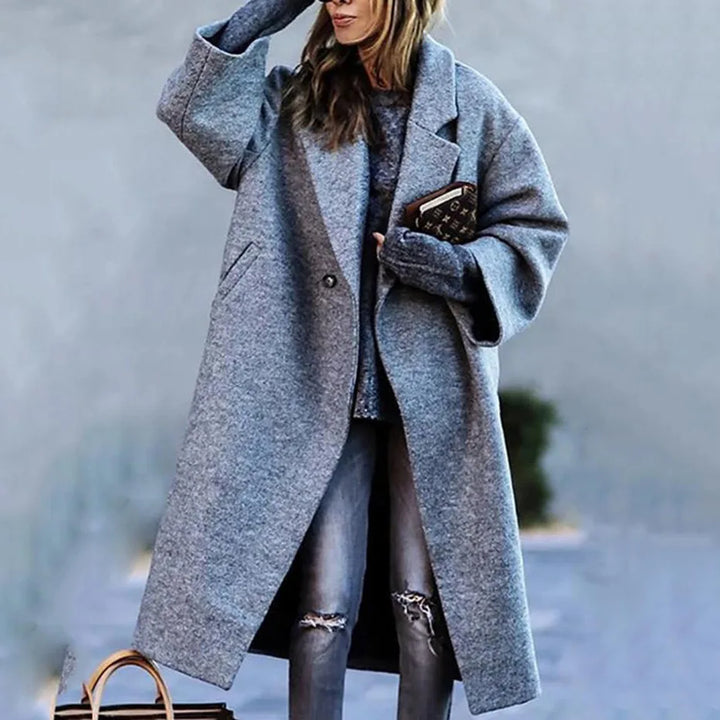 Stylish oversized coat, ultimate comfort and versatile fashion in a trendy unisex design.