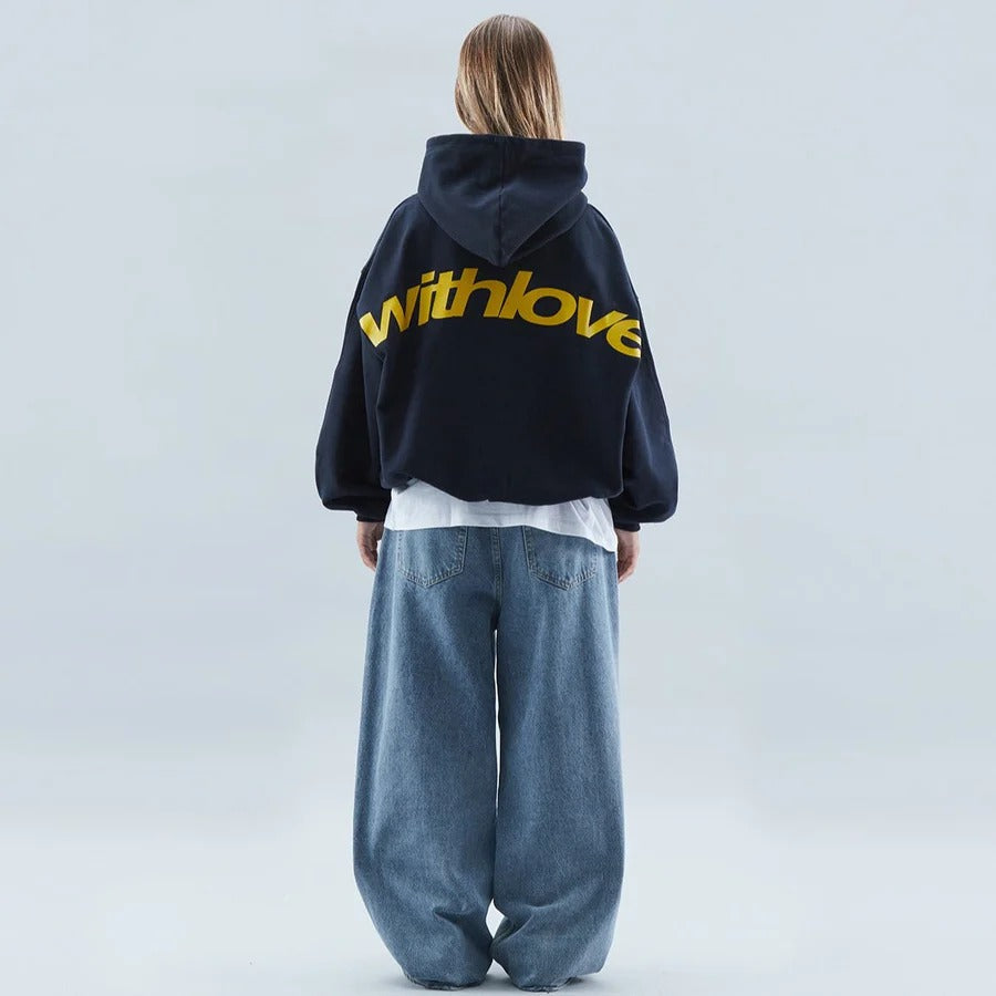 Streetwear style oversized hoodie for unisex, featuring a trendy slogan print. Comfortable and fashionable top.