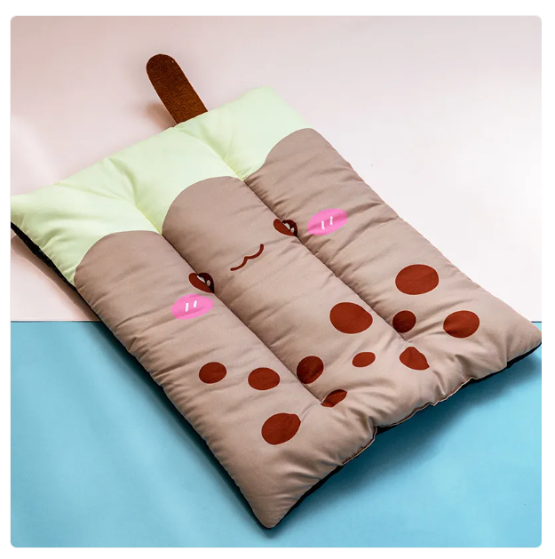 Cat & dog cooling bed mat with a fun fruit design, an essential for summer pet comfort.