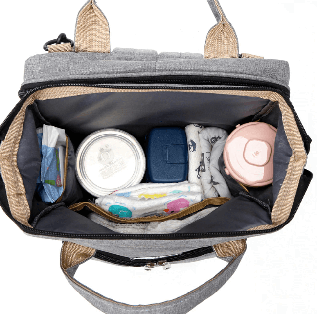 Waterproof parent essential: baby bed, diaper bag & travel backpack.