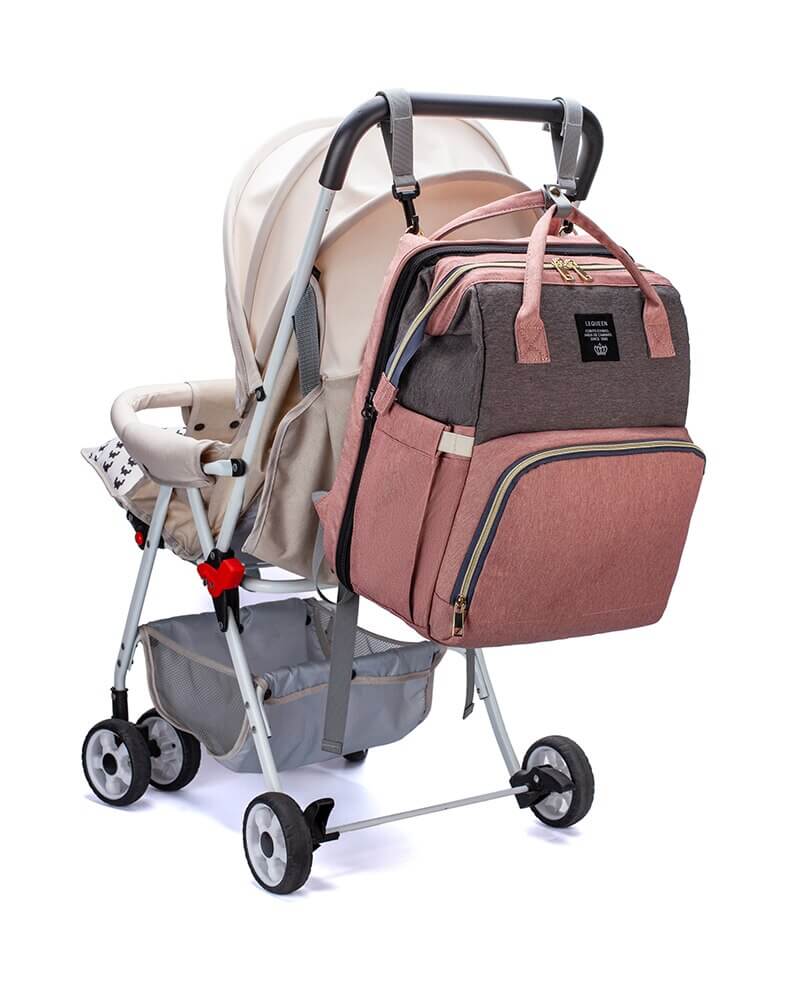 Infant travel solution: portable baby bed bassinet & nappy bag backpack.
