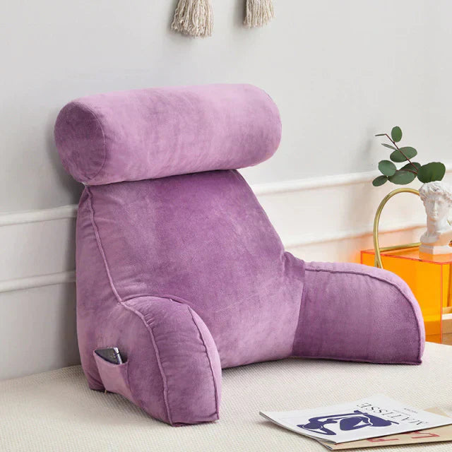 Ergonomic memory foam reading pillow with back & arm support for adults. Enhances comfort while reading in bed.