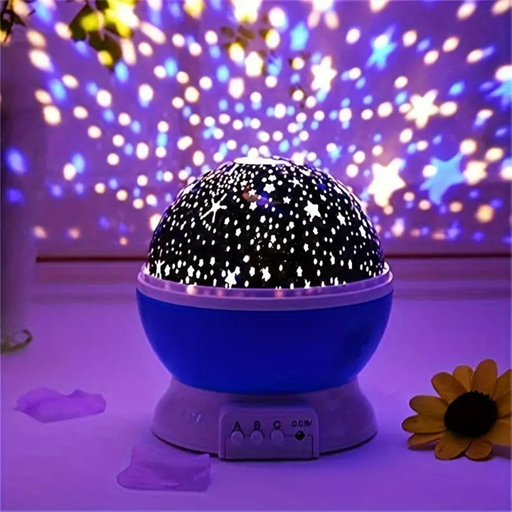 Kids' rotating star projector night light, featuring calming LED stars for a child's bedroom decor.