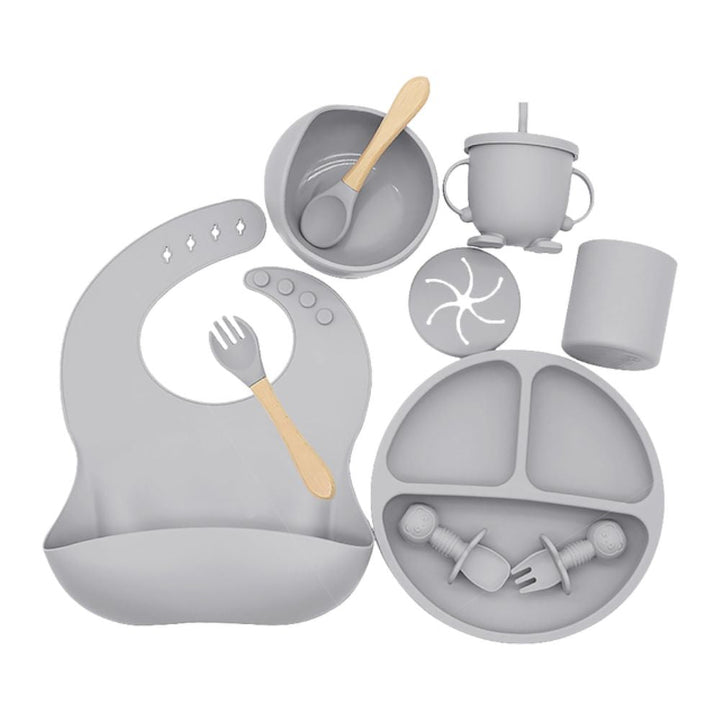 BPA-free silicone baby feeding set, perfect for toddlers. Includes strong suction bowl & soft, adjustable bib for safe weaning.