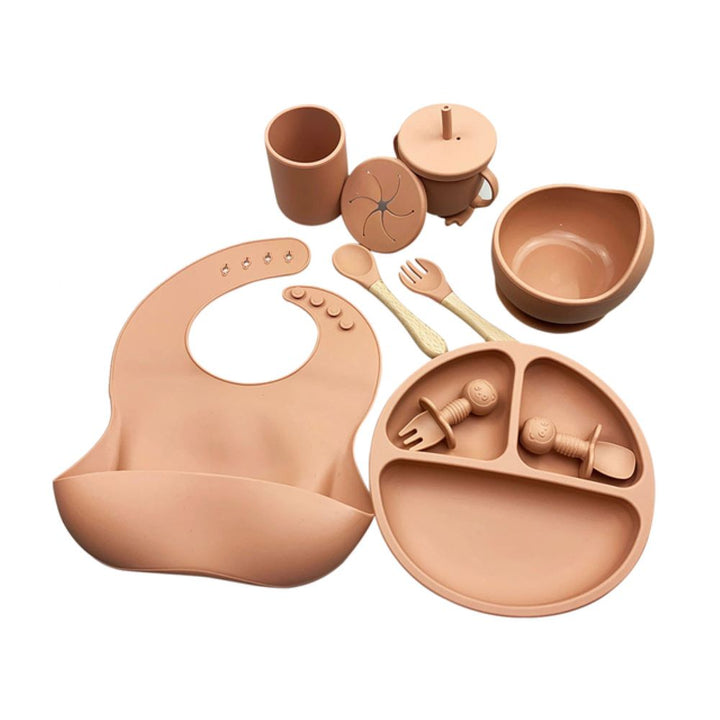 Easy baby-led weaning with this silicone set. Features a strong suction bowl, waterproof bib, and soft utensils for toddlers.