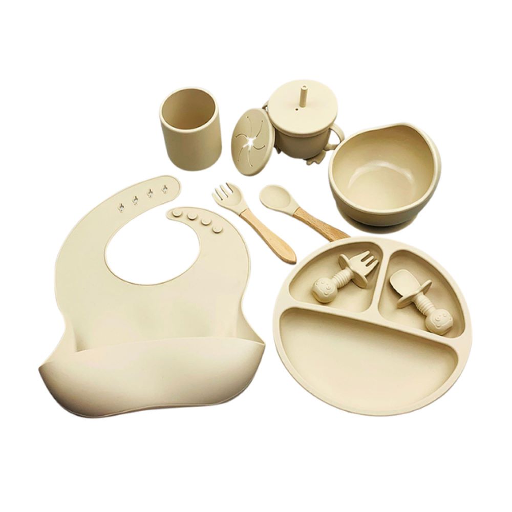 Complete silicone baby feeding set: Includes a durable suction bowl, adjustable bib, & toddler-friendly spoon for safe mealtimes.