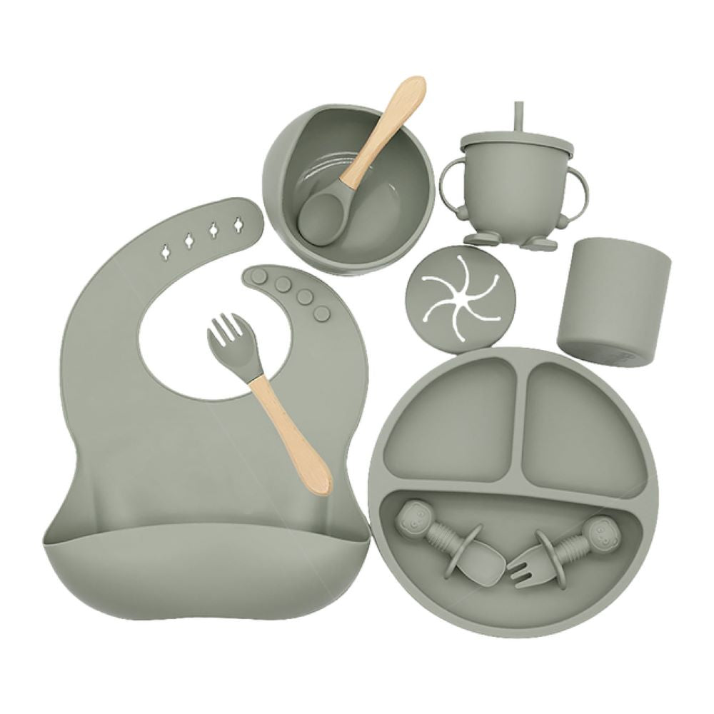 No-mess silicone baby feeding set with strong suction bowl to prevent spills. Includes a comfortable, adjustable bib for infants.