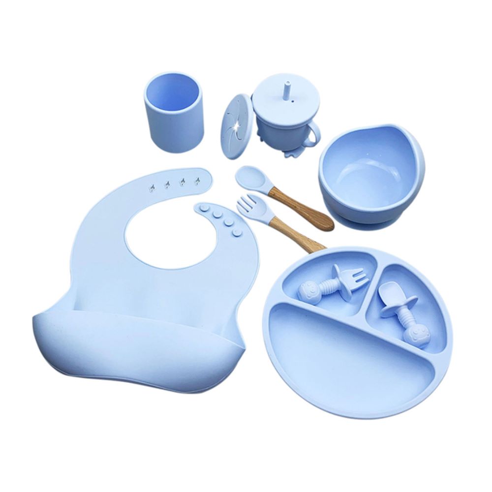 Food-grade silicone baby feeding set for easy cleaning. Features a non-slip suction bowl & adjustable waterproof bib for babies.