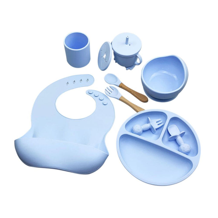 Food-grade silicone baby feeding set for easy cleaning. Features a non-slip suction bowl & adjustable waterproof bib for babies.