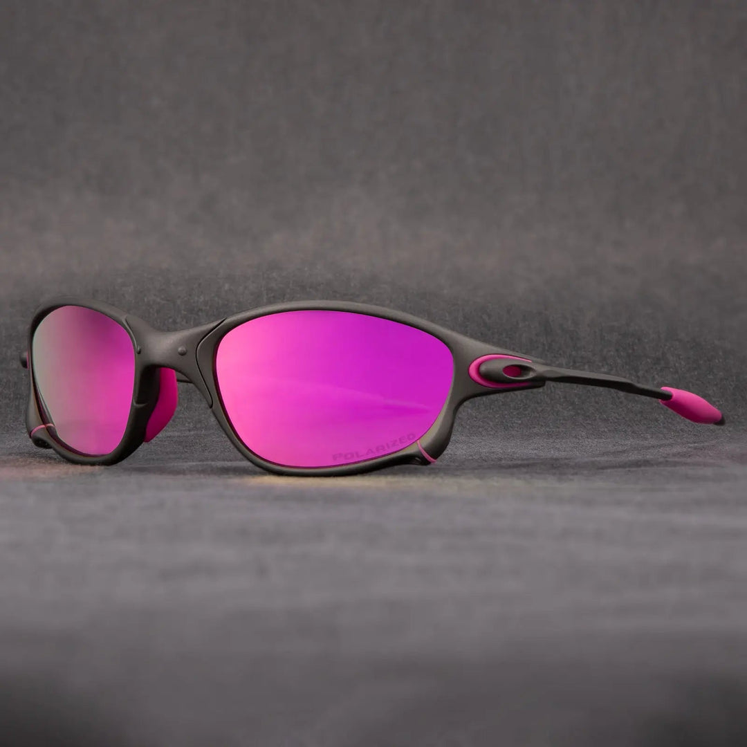 Sporty polarized sunglasses with sleek metallic frame & vibrant red lenses. Perfect for outdoor activities & glare reduction.