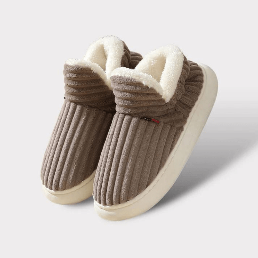 Top view of comfortable thermal unisex slippers, non-slip sole visible, for ultimate indoor coziness.